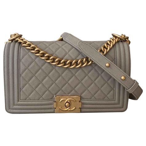 chanel single color medium boy flap bag|Chanel mini flap bag with top handle.